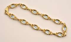 Fashionable Gold & Blue Topaz Bracelet