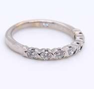 Sparkling White Gold Leo Cut Diamond Band