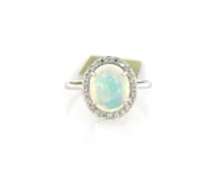 Attractive New oval Opal Cabochon and Diamond Ring