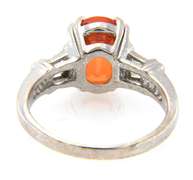 Fancy White Gold oval Orange Garnet and Baguette Diamond Ring