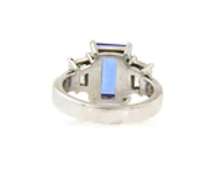Quintessential Emerald Cut Tanzanite and Trapezoid Diamond Ring