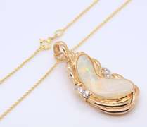 Attractive Yellow Gold Bean Shaped Opal and Diamond Pendant on Chain