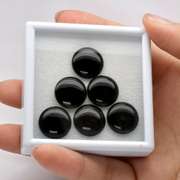 Substantial 39.30 carats of untreated silky black Onyx