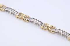 Handsome Two Tone Gold Diamond Tennis Bracelet Closed with a Push Button Tongue Style Box Clasp