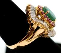 18k yellow gold ladies emerald rubies and diamond ballerina ring.