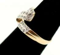 Contemporary Ribbon Shaped Channel Set Diamond Ring with 10k Gold