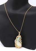 Attractive Yellow Gold Bean Shaped Opal and Diamond Pendant on Chain