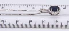 Shimmering Blue Sapphire and Diamond Pendant on Chain