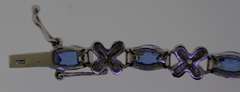 Sterling Silver XO Blue Stone Bracelet