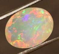Wonderful glittering 2.05ct faceted Jelly Opal