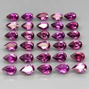 Ravishing 7.55ct violet pink Rhodolite Garnet set