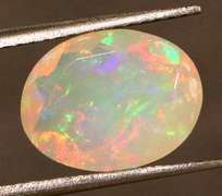 Wonderful glittering 2.05ct faceted Jelly Opal