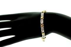 14k white and yellow gold ladies diamond bracelet xo design
