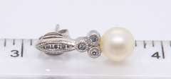 Elegant White Gold Pearl and Bezel Set Diamond Earrings