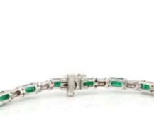 Eyecatching White Gold Emerald Cut Emerald and Baguette Diamond Bracelet