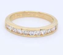 Stunning Yellow Gold Channel Set Diamond Band