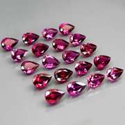 Premium pear cut 9.49ct VS Rhodolite Garnet set