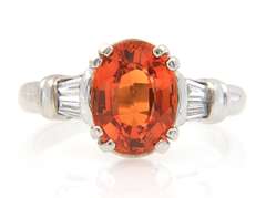 Fancy White Gold oval Orange Garnet and Baguette Diamond Ring