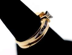 Shiny 10k Gold Oval Diamond Ring Flanked with Baguette Diamonds