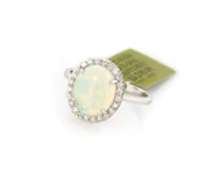 Attractive New oval Opal Cabochon and Diamond Ring