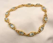 Fashionable Gold & Blue Topaz Bracelet
