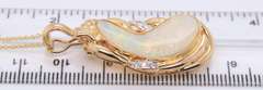 Attractive Yellow Gold Bean Shaped Opal and Diamond Pendant on Chain