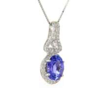 Romantic White Gold oval Tanzanite and Diamond Pendant
