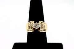 Gorgeous Centerpiece Diamond Ring with Channel Set Diamonds on a 18k Gold Band