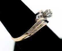 10k White and Yellow Gold Centerpiece Diamond Ring Flanked with Channel Set Diamonds