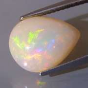 Brilliant flashing 2.62ct semi-black Opal