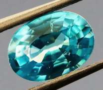 Glittering .89ct diamond luster blue Zircon
