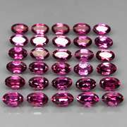 Ravishing 8.51ct violet pink Rhodolite Garnet set