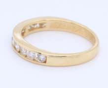 Stunning Yellow Gold Channel Set Diamond Band