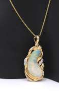 Attractive Yellow Gold Bean Shaped Opal and Diamond Pendant on Chain