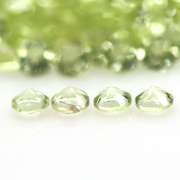 Real 5.69ct untreated apple green Peridot set