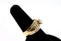 Gorgeous Centerpiece Diamond Ring with Channel Set Diamonds on a 18k Gold Band