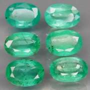 Vivid! Top green 4.63ct Colombian Emerald set