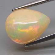 Brilliant flashing 2.62ct semi-black Opal