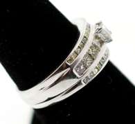 18k White Gold Centerpiece Diamond Ring with Channel Set Diamonds