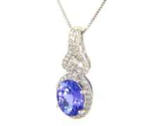 Romantic White Gold oval Tanzanite and Diamond Pendant