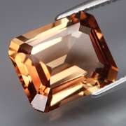 Stunning 7.01ct 10x12mm emerald cut Imperial Topaz