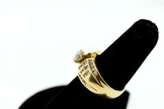 Gorgeous Centerpiece Diamond Ring with Channel Set Diamonds on a 18k Gold Band