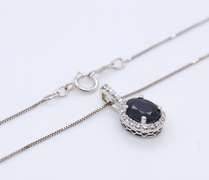 Shimmering Blue Sapphire and Diamond Pendant on Chain