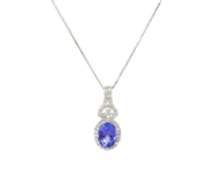 Romantic White Gold oval Tanzanite and Diamond Pendant