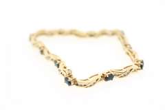 LADIES 14 KT YELLOW GOLD DIAMOND AND SAPPHIRE BRACELET.