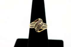 Attractive Ribbon 10k Gold Channel Set Diamond Ring