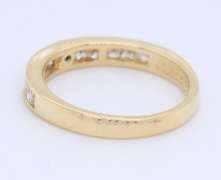 Stunning Yellow Gold Channel Set Diamond Band