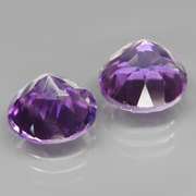 Glittering 7.35ct round cut Bolivian Amethyst set