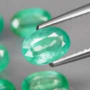 Vivid! Top green 4.63ct Colombian Emerald set