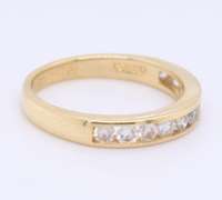 Stunning Yellow Gold Channel Set Diamond Band